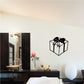 Vinyl gift wall decal showing a black outline gift box with bow and ribbon