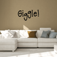 Giggle! wall decal lettering in black on a light wall