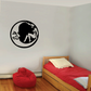 Moon wall decal with seated girl silhouette, black circle design