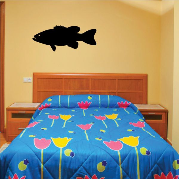 Black fish wall decal in profile, with fins and tail visible