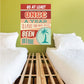 Travel quote sticker reading “Go at least once a year” with “Been before” in red and blue