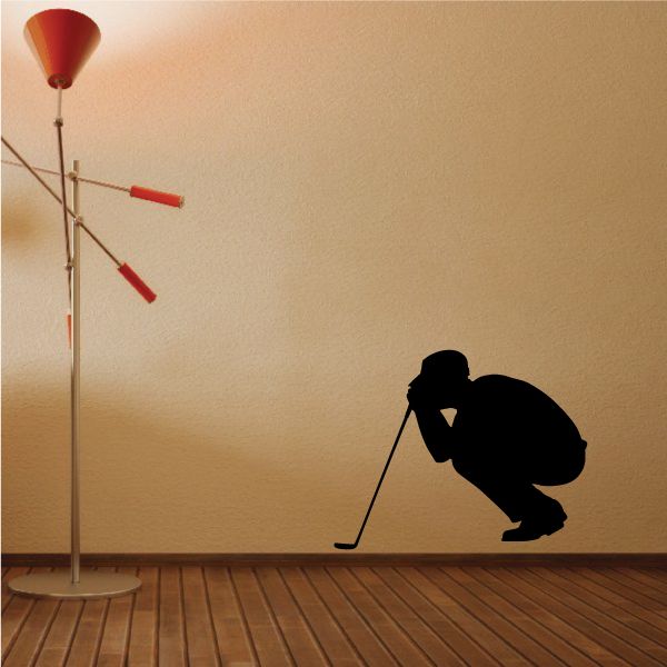 Golf putting lineup wall decal: golfer silhouette holding putter with red guide lines