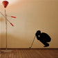 Golf putting lineup wall decal: golfer silhouette holding putter with red guide lines