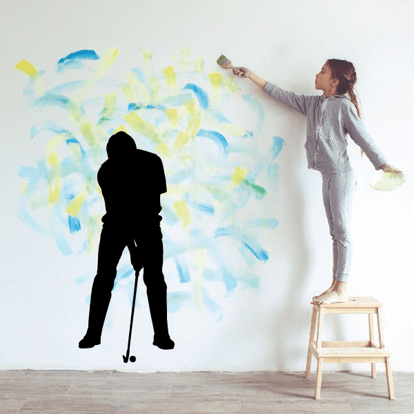 Black vinyl golf wall decal with golfer silhouette holding a club