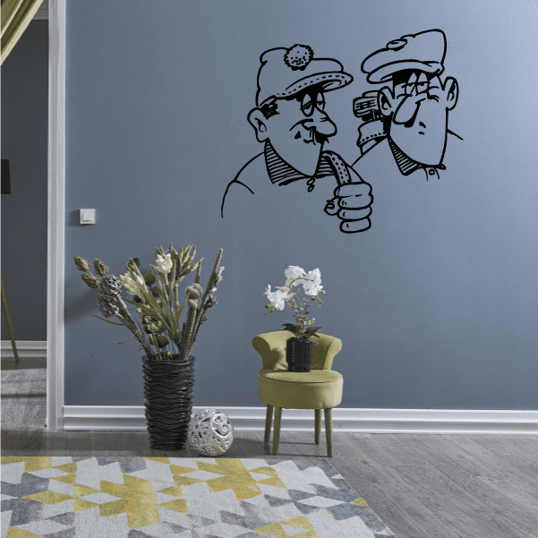 Golf wall decal with two cartoon golfers in black line art.