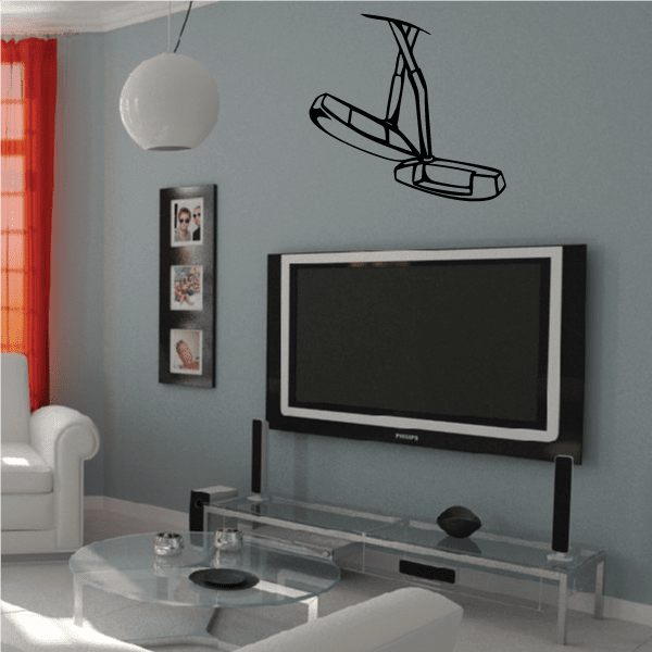 Golf swing wall decal, black vinyl silhouette of golfer mid-shot