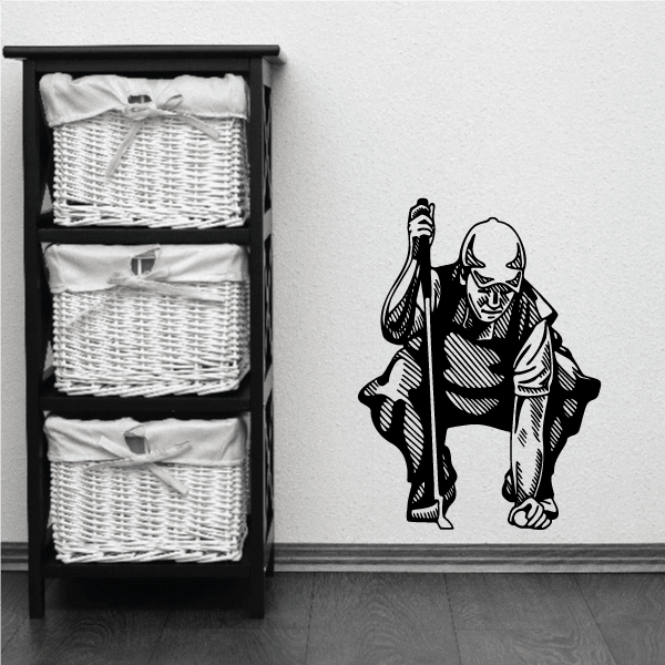 Golfer wall decal, black golfer holding a club on a light background