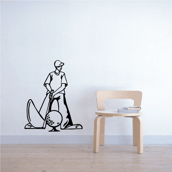 Golfer wall decal of a seated golfer holding a ball on the ground, black outline