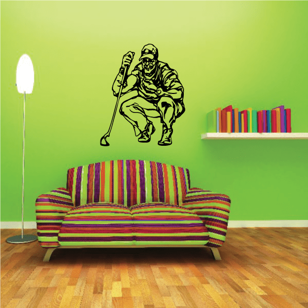 Golfer wall decal with black silhouette of a golfer holding a raised club