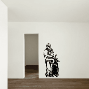 Golfer wall decal in black, featuring a golfer holding a club and ball