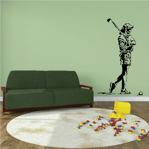 Golfer vinyl wall decal: golfer holding club standing in black silhouette.
