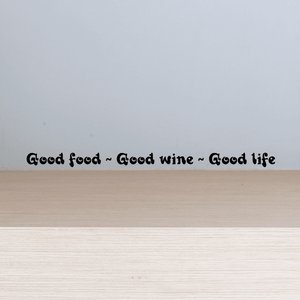 Wall decal with cursive text: "Good food ~ Good wine ~ Good life"