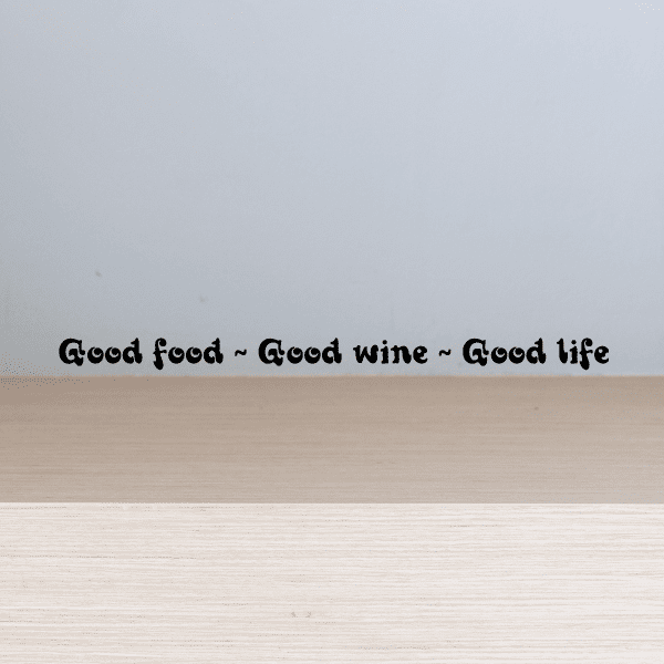 Wall decal with cursive text: "Good food ~ Good wine ~ Good life"