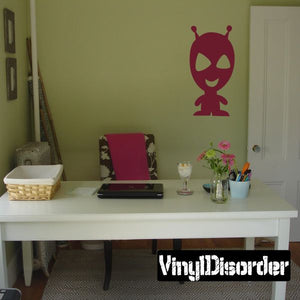 Red goofy alien wall decal with big eyes and antenna, playful cartoon figure