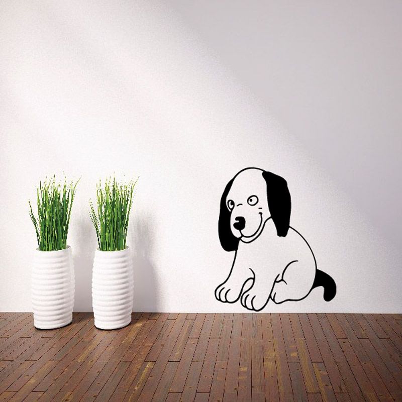 Goofy puppy wall decal of a sitting black-and-white cartoon dog with friendly face