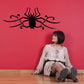 Gothic spider wall decal with black floral swirl web design
