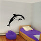 Black and white dolphin wall decal with curved body and fin