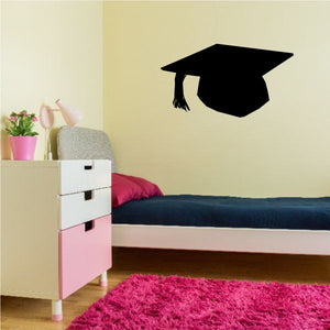 Black graduation cap wall decal with tassel and mortarboard silhouette