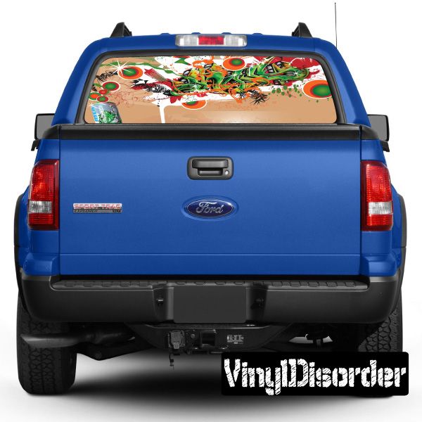 Blue pickup truck rear window with colorful graffiti graphic and tailgate