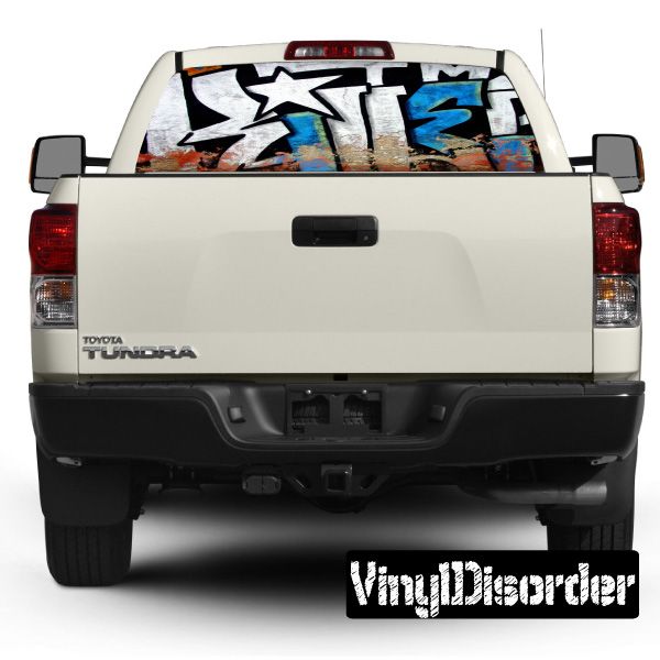 White pickup truck rear window graphic with graffiti stars and colorful panels