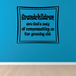 Wall decal with square border and quote: "Grandchildren are gods way of compensating us"