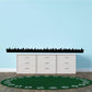 Dark green grass wall decal with scattered light spots, wide border strip design