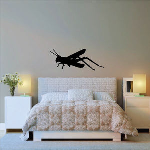 Grasshopper gliding wall decal, black insect silhouette