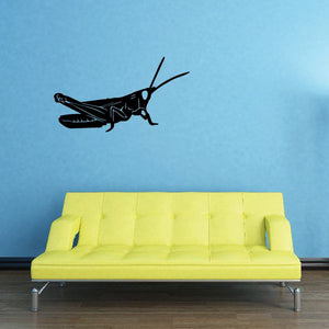 Grasshopper resting decal, black silhouette with outstretched legs and antennae