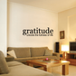 Wall decal: 'gratitude' and 'unlocks the fullness of life'