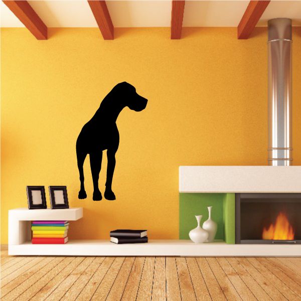 Black Great Dane sitting-looking over wall decal silhouette, simple dog outline.