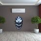 Alien skull sticker with grinning face, blue and black outline