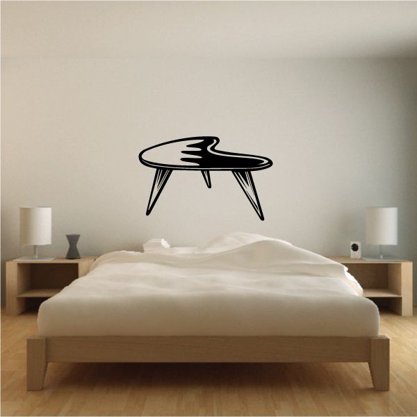 Coffee table decal featuring a black side table with three legs