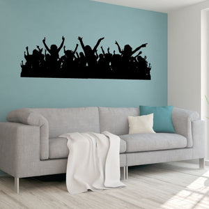 Dancing fan silhouette wall art with raised arms, black crowd scene