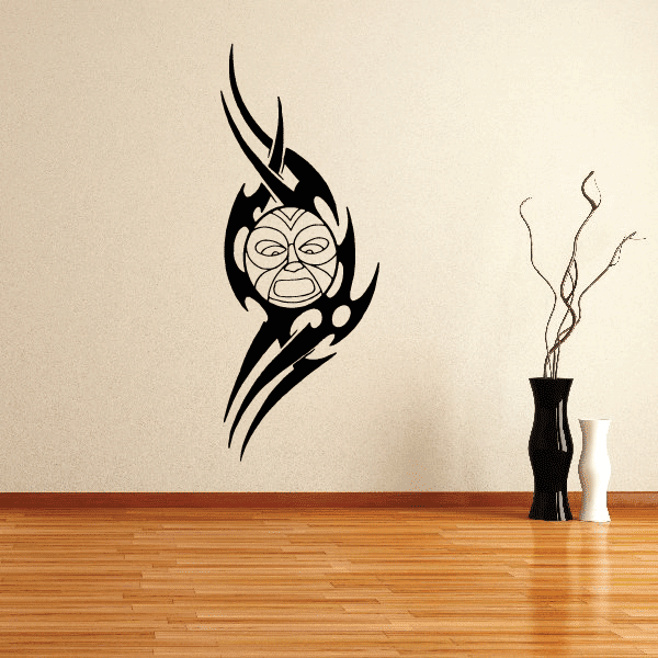 Black stylized moon face wall decal with flame-like accents