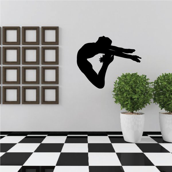Gymnastics wall decal vinyl of black gymnast silhouette landing on floor