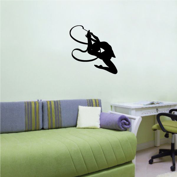 Gymnastics wall decal: black gymnast silhouette midair