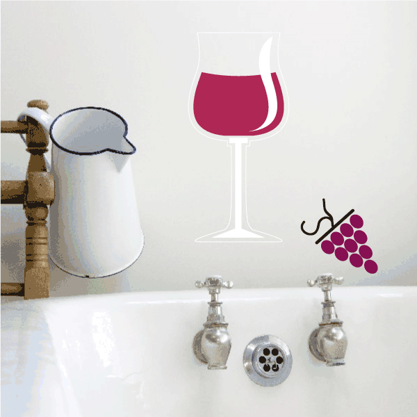 Wine glass with grapes sticker, half-full red wine and grape cluster