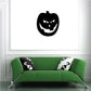 Halloween evil jack-o-lantern decal: black circular grinning pumpkin face
