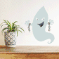 Halloween ghost sticker of a floating pale ghost holding broken chains