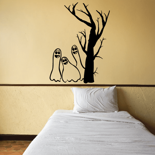 Image of Halloween Ghosts Trio behind tree Decal