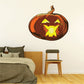 Halloween jack-o-lantern sticker with orange pumpkin and yellow star-shaped mouth