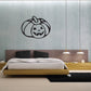 Halloween jack-o-lantern smiling wall decal with black outline on light wall