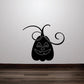 Halloween jack-o-lantern wild vines decal: black pumpkin face with curling vine accents