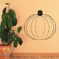 Halloween pumpkin decal with rounded black outline, vertical ridges, and stem