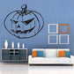 Scary jack-o-lantern pumpkin decal with jagged face in dark outline