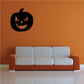 Halloween jack-o-lantern wall decal, black silhouette with one-tooth grin