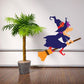 Witch flying on a broom sticker, purple hat and dress with orange trim