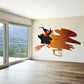 Halloween witch riding broom sticker with orange and red swoosh background