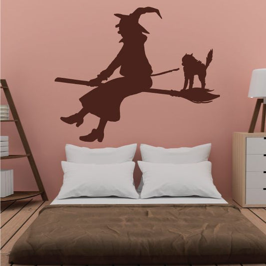 Image of Halloween Witch Riding on Broom with Cat Sticker