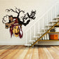 Halloween witch sticker with tombstone and bats, stylized black silhouette